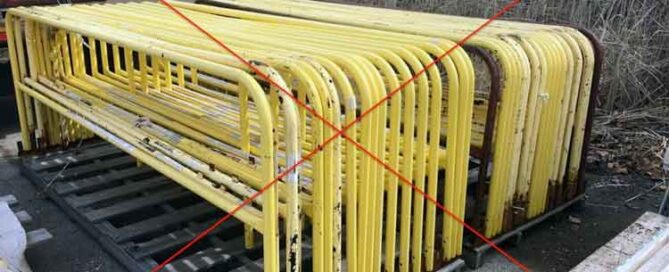 Yellow Powder-Coated Guardrail Rusted