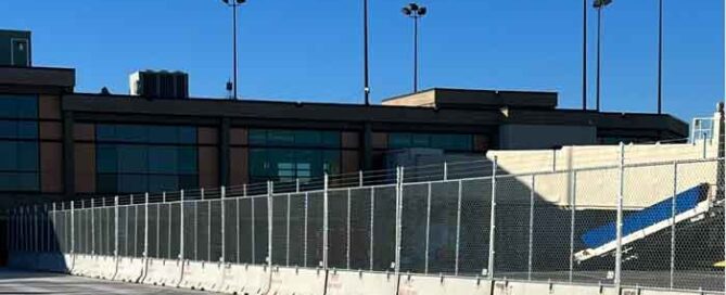 barrier fence with barbed wire at airport hilmerson safety