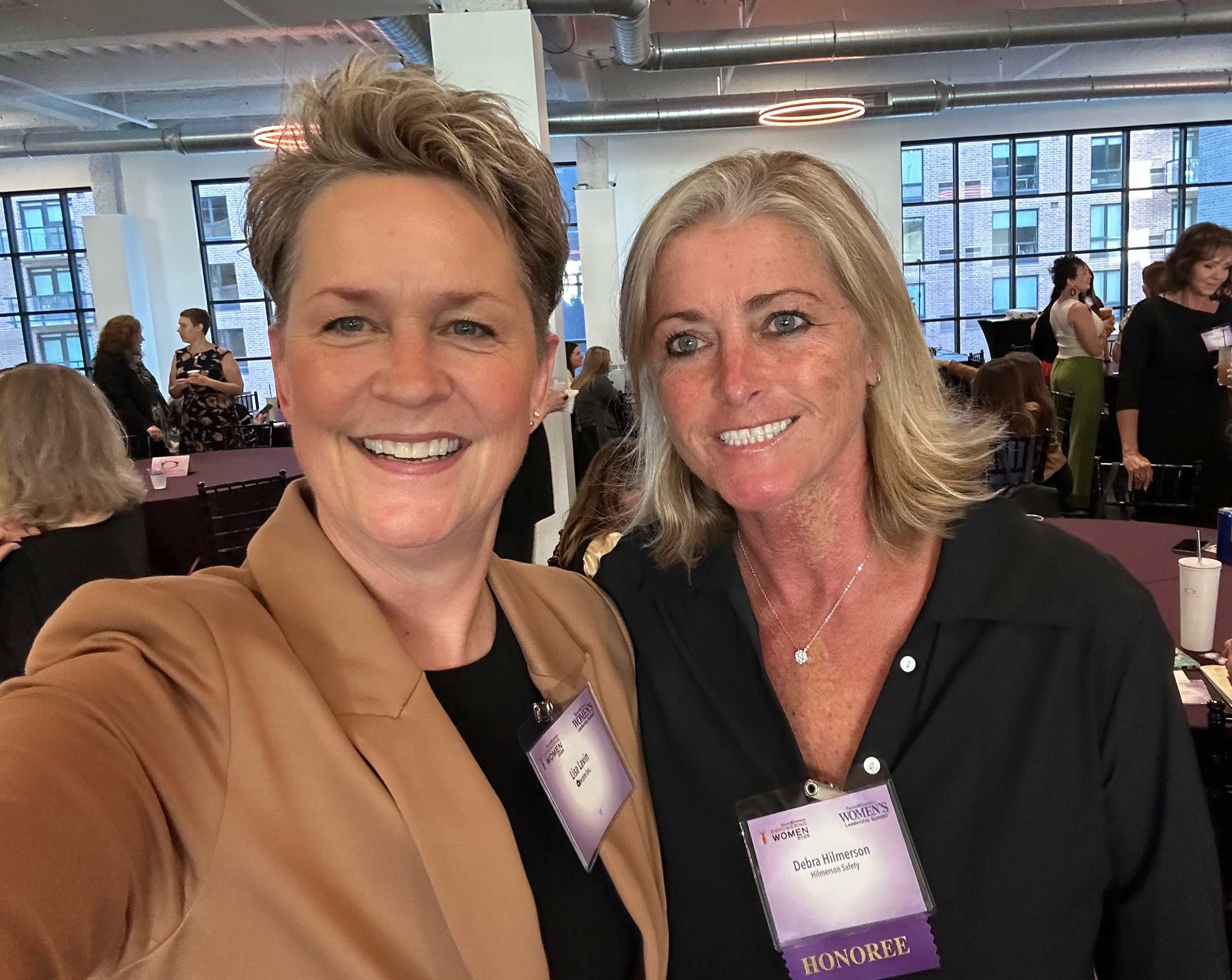 Deb Hilmerson with another woman at Empowering Women event